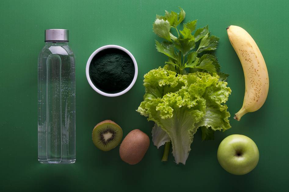 Blogger preparing balanced meal plan with wholesome ingredients