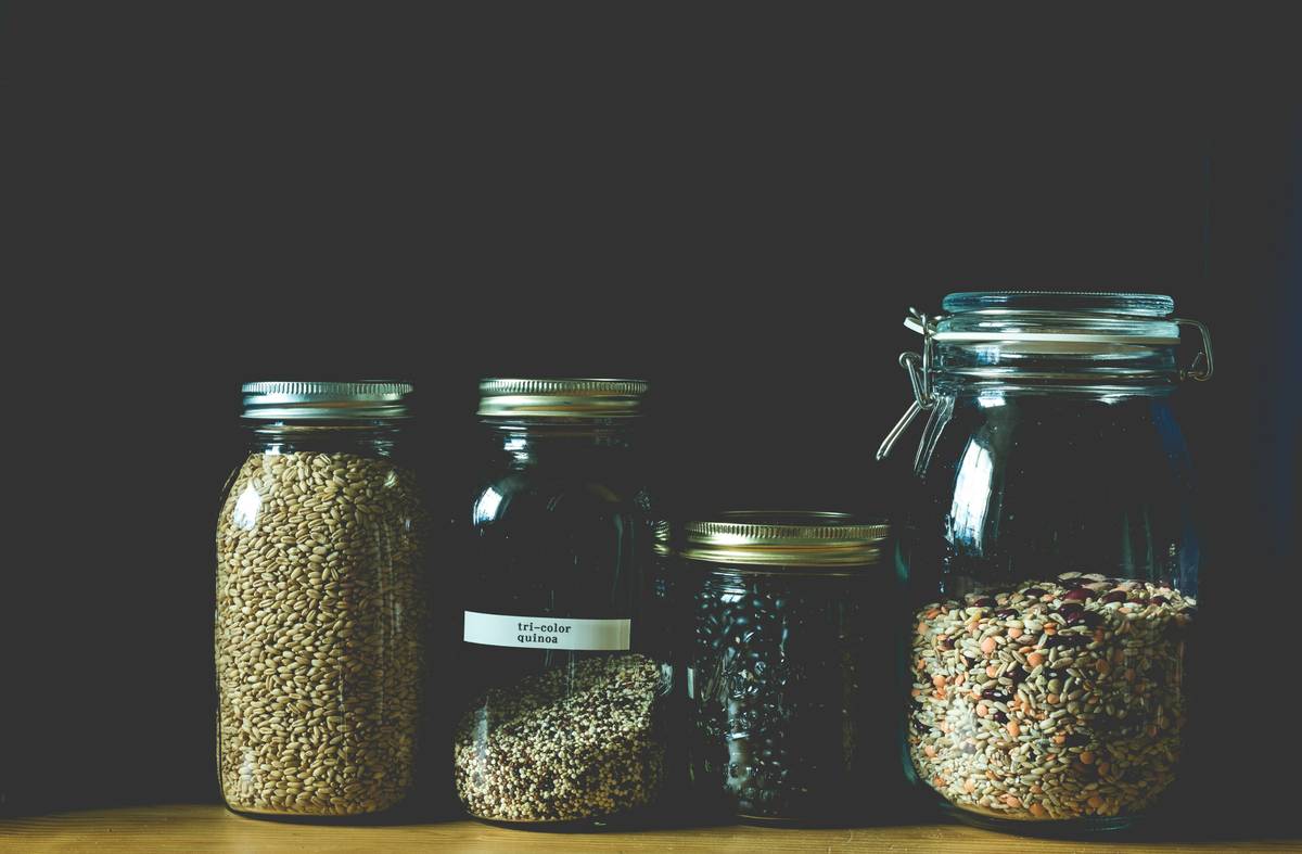 Infographic showing how prebiotic fiber feeds probiotic bacteria in the gut, creating short-chain fatty acids that reduce inflammation and improve digestion